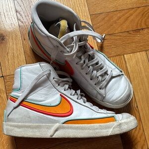 Nike White High-Tops with Orange and Red Accents